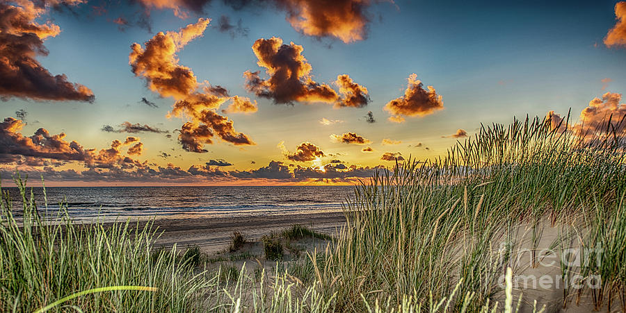 Cloudy Sunst on the Dutch beach Photograph by Alex Hiemstra