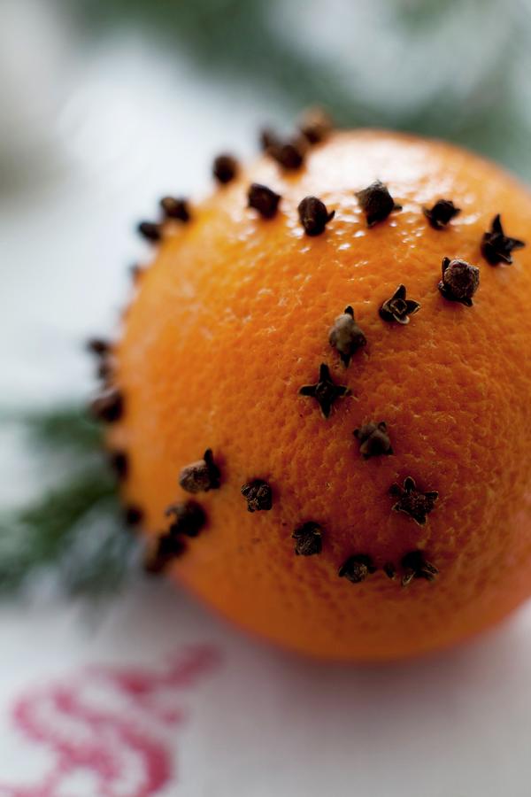 Cloves Decorated Orange Photograph by Mans Jensen