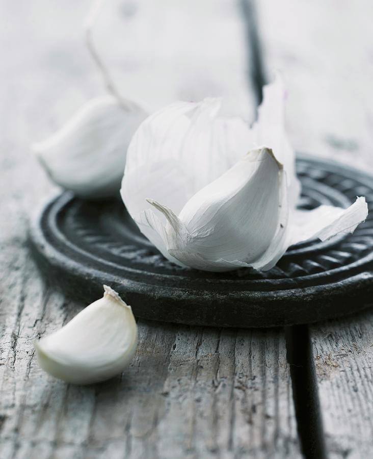 Cloves Of Garlic Photograph by Mikkel Adsbl