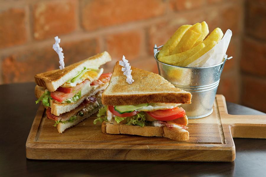 Club Sandwiches With Chips Photograph by Tim Winter