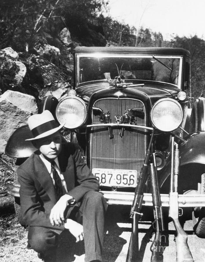 Clyde Barrow With Guns And Automobile Photograph by Bettmann