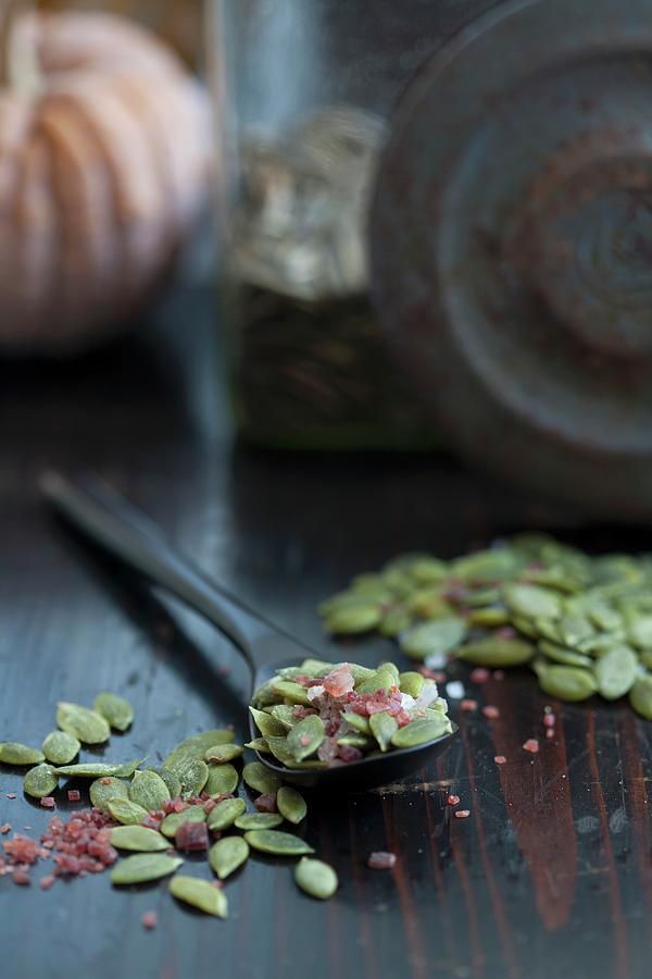 Coarse Salt And Pumpkin Seeds Photograph by Martina Schindler