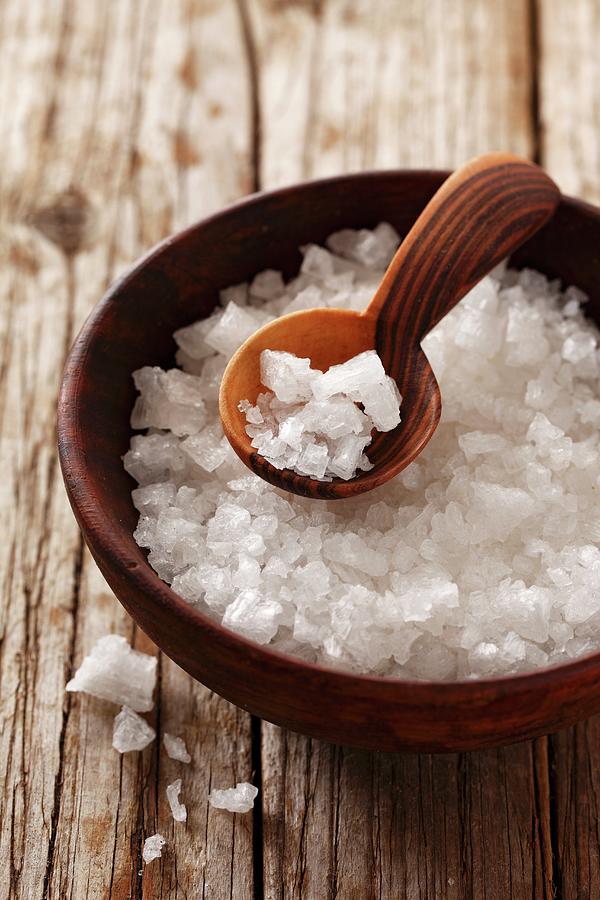 Coarse Sea Salt In A Small Wooden Bowl Photograph by Petr Gross