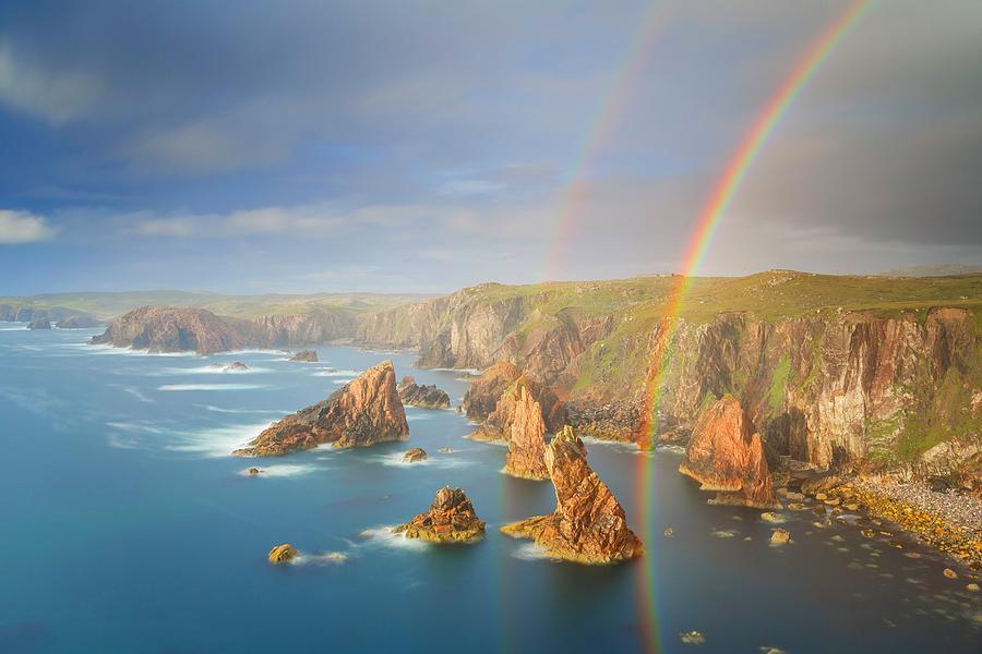 Coast With Rocks & Rainbows Digital Art by Fortunato Gatto