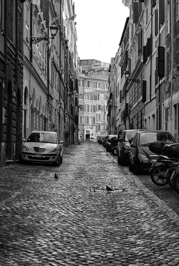 Cobblestone Side Street Scene Urban Rome Italy Black and White Photograph by Shawn OBrien