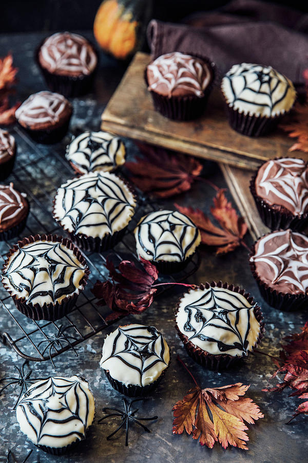 Cobweb Cakes For Halloween With Mini Pumpkins Photograph by Joan Ransley