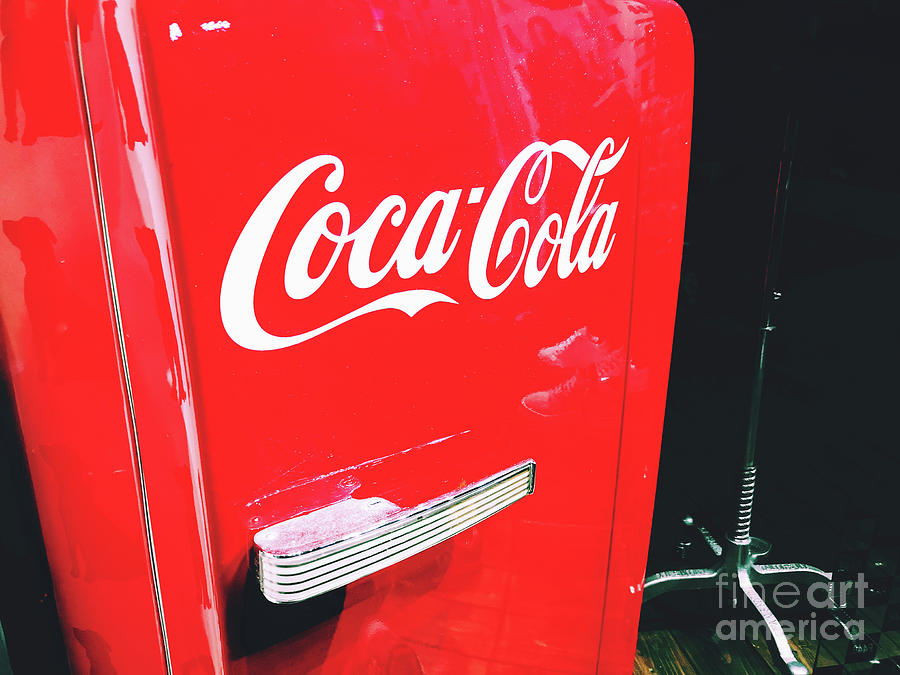 Coca Cola logo on a coke red retro fridge refrigerator Photograph by Luca Lorenzelli