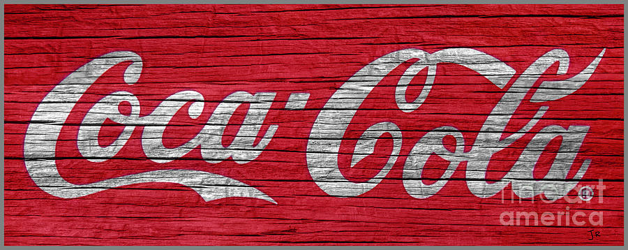 Coca Cola Sign On Weathered Wood Grain Photograph by John Stephens