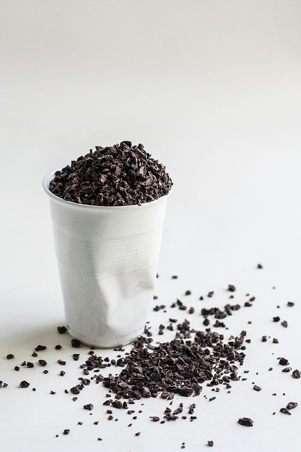 Cocoa Nibs In A Cup And Next To It Photograph by Sneh Roy