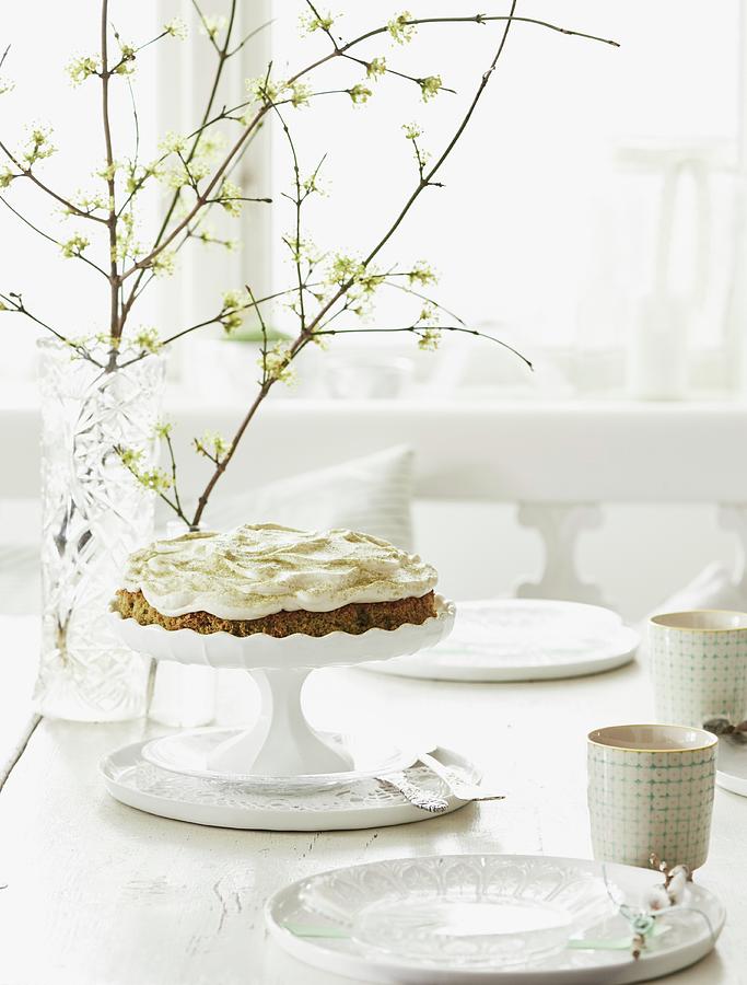 Coconut And Carrot Cake With Cream Cheese Topping On A Coffee Table Photograph by Hannah Kompanik