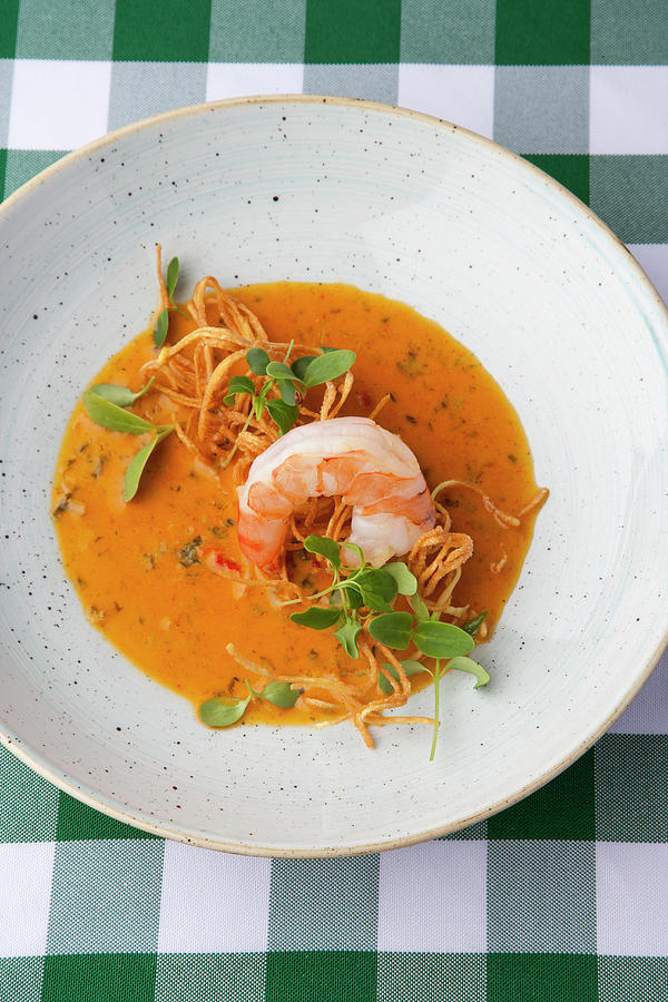 Coconut And Curry Soup With Prawns Photograph by Michael Wissing