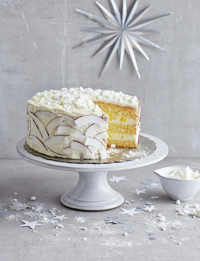 Coconut And Mango Cake With Meringue Photograph by Jalag / Julia Hoersch