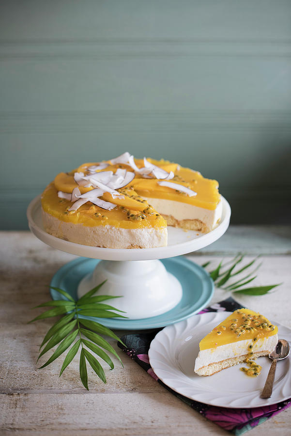 Coconut And Mango Cheesecake With Fresh Passion Fruit And Mango Pieces, Slice Removed Photograph by Magdalena Hendey
