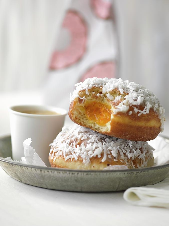 Coconut Doughnuts Filled With Jam Photograph by Laurie Proffitt
