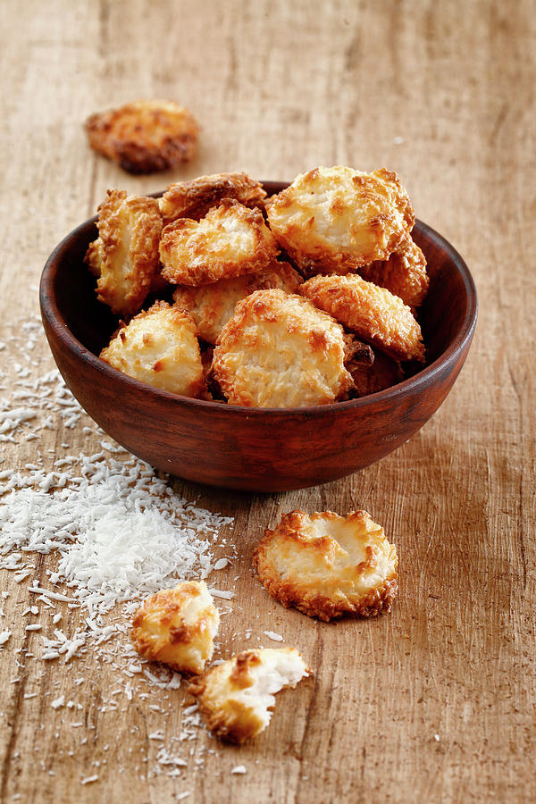 Coconut Macaroons In A Wooden Bowl Photograph by Petr Gross
