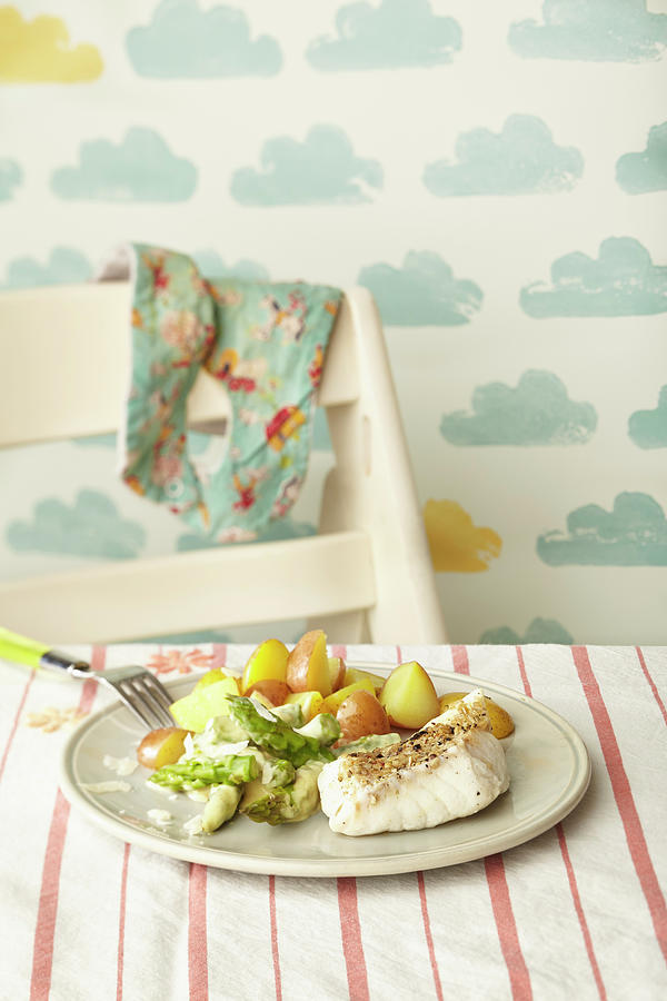 Cod Fillet With Asparagus Ragout And Potatoes Photograph by Meike Bergmann