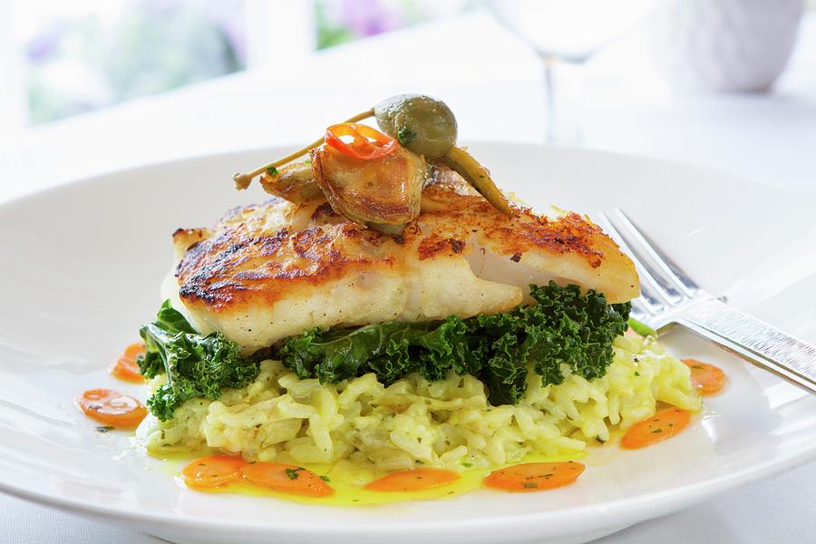 Cod Fillet With Green Kale On Lemon Risotto Rice Photograph by Gus Cantavero Photography
