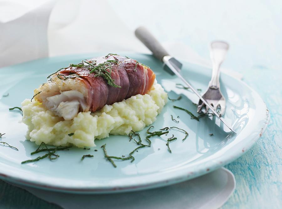 Cod Fillet Wrapped In Smoked Ham With Sage On Cauliflower Pure Photograph by Mikkel Adsbl