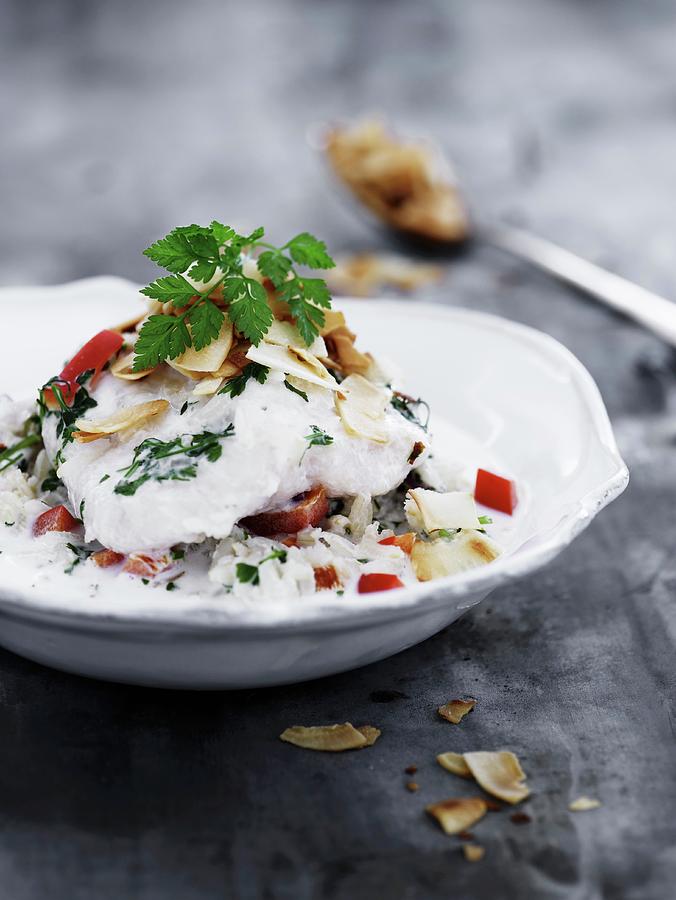 Cod On A Bed Of Rice With Peppers And Coconut Sauce Photograph by Mikkel Adsbl