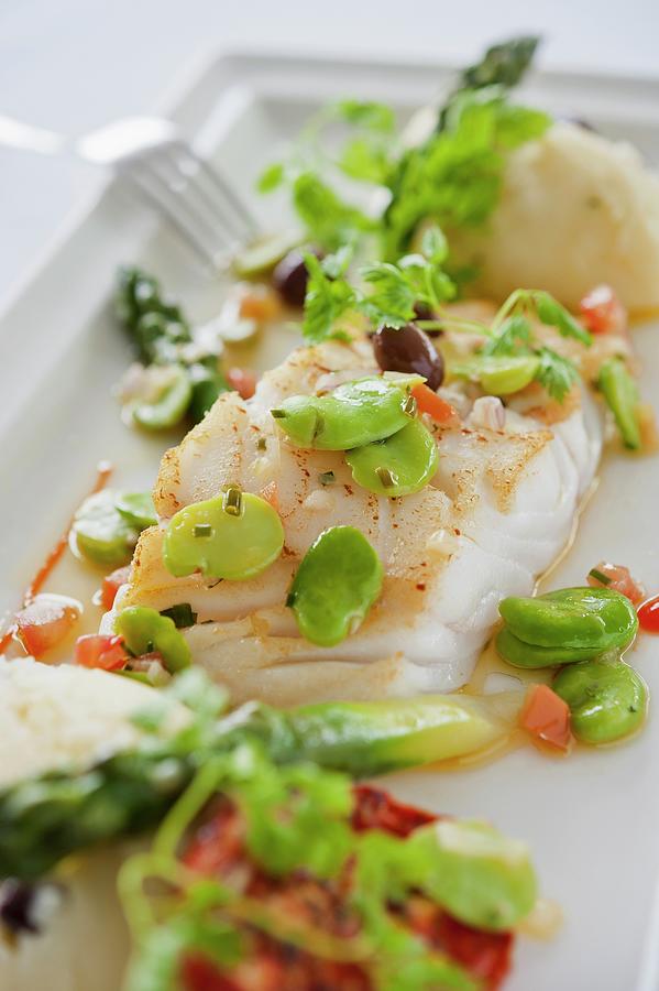 Cod With Spring Vegetables Photograph by Anthony Lanneretonne