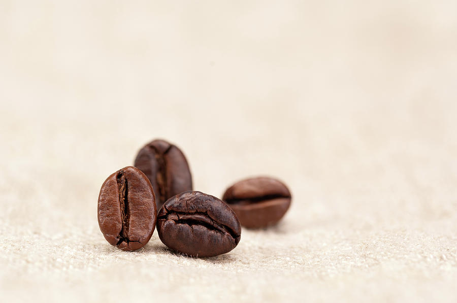 Coffee Beans On Sack Cloth Photograph by Stockcam