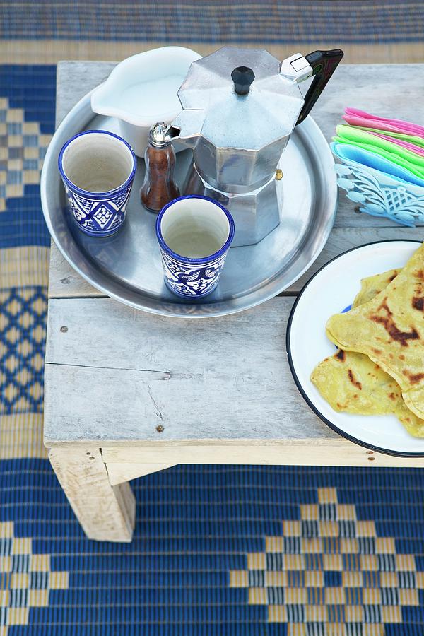 Coffee Pot And Beakers On Tray Next To Plate Of Moroccan Flatbread Photograph by Alexander Van Berge