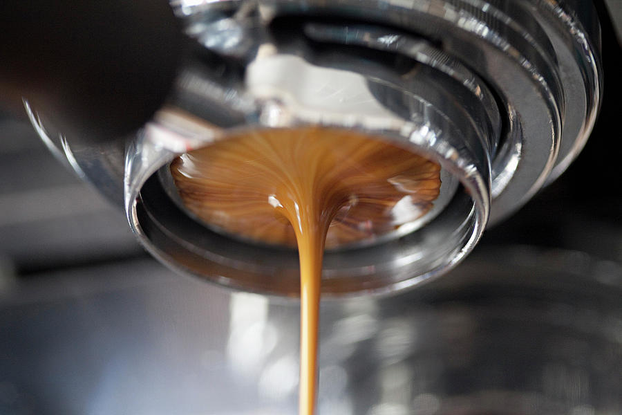 Coffee Pouring From An Espresso Machine Photograph by Steven Joyce
