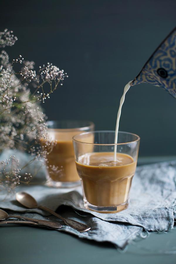 Coffee With Milk In A Glass Photograph by Alicja Koll