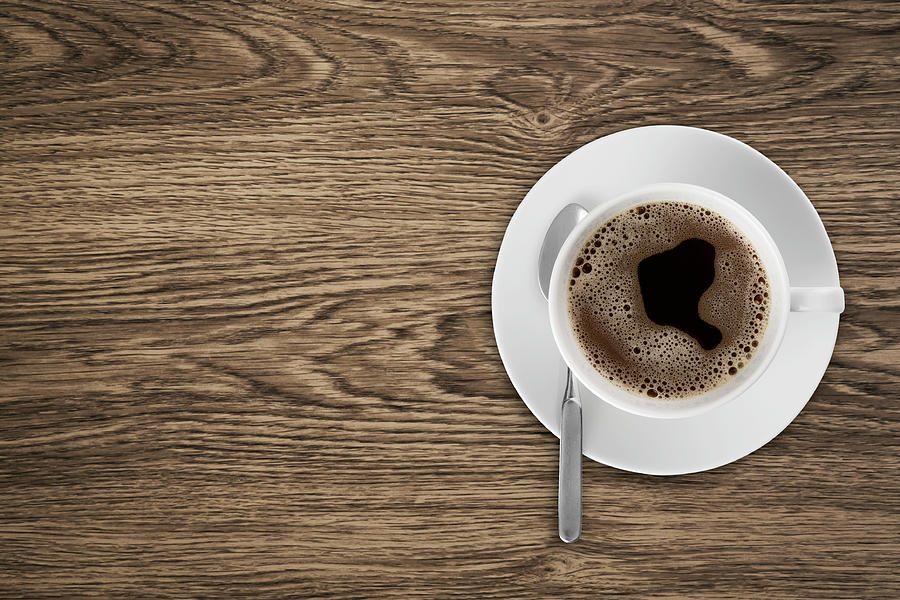 Coffeecup With Coffee In It On A Wooden Photograph by Daneger Coffeecup With Coffee In It On A Wooden Photograph by Daneger