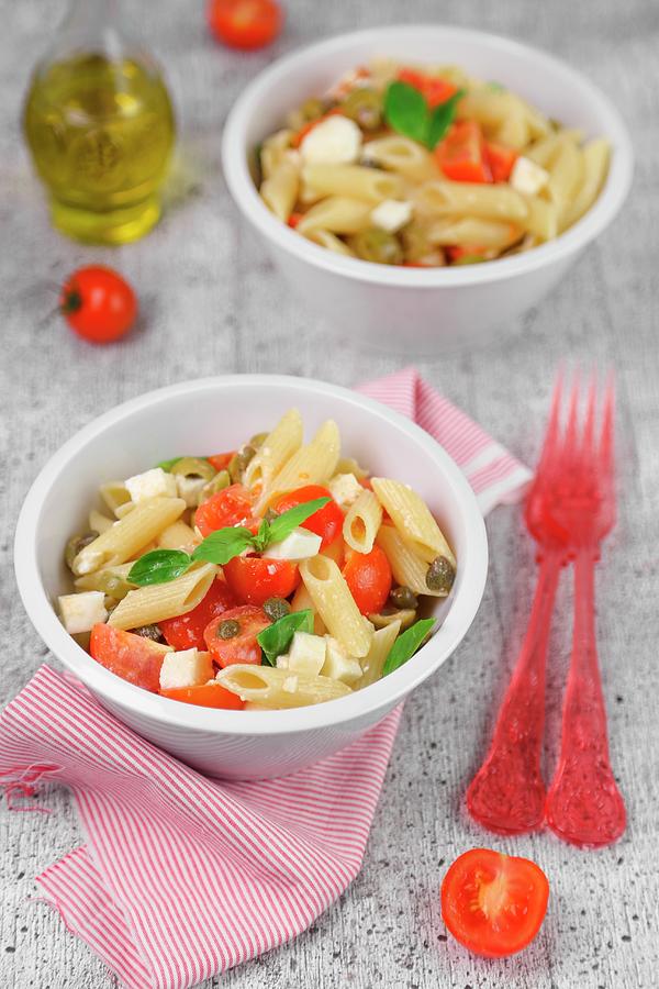 Cold Pasta With Tomatoes, Cheese And Basil Photograph by Claudia Gargioni