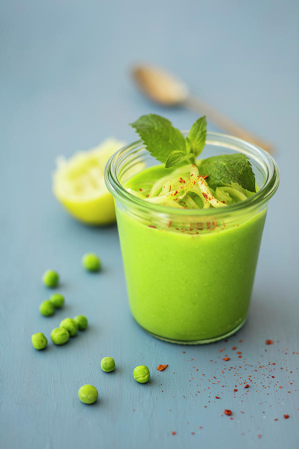 Cold Pea Soup With Mint, Lime Juice And Cucumber Noodles vegan Photograph by Jan Wischnewski