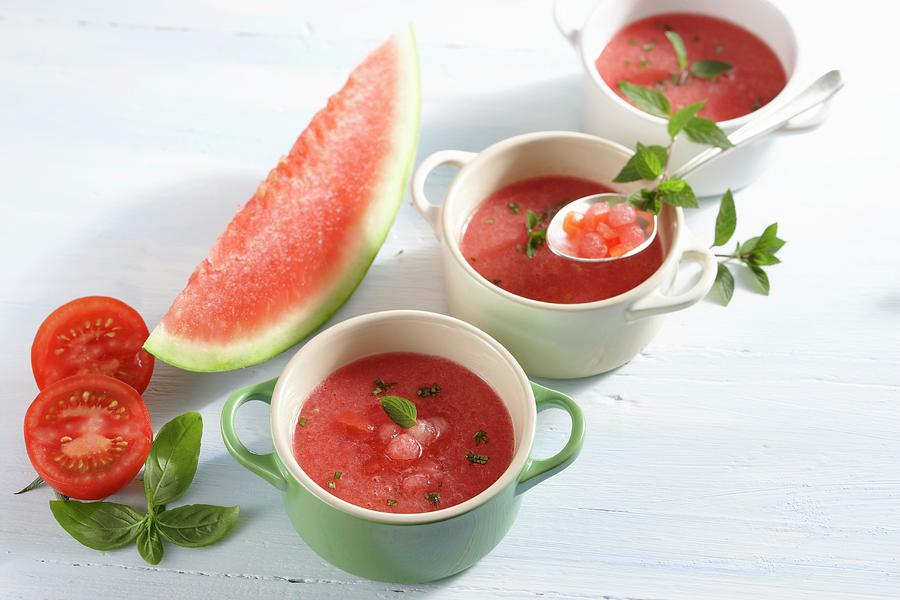 Cold Spicy Melon Soup With Chilli And Diced Tomatoes Photograph by Teubner Foodfoto