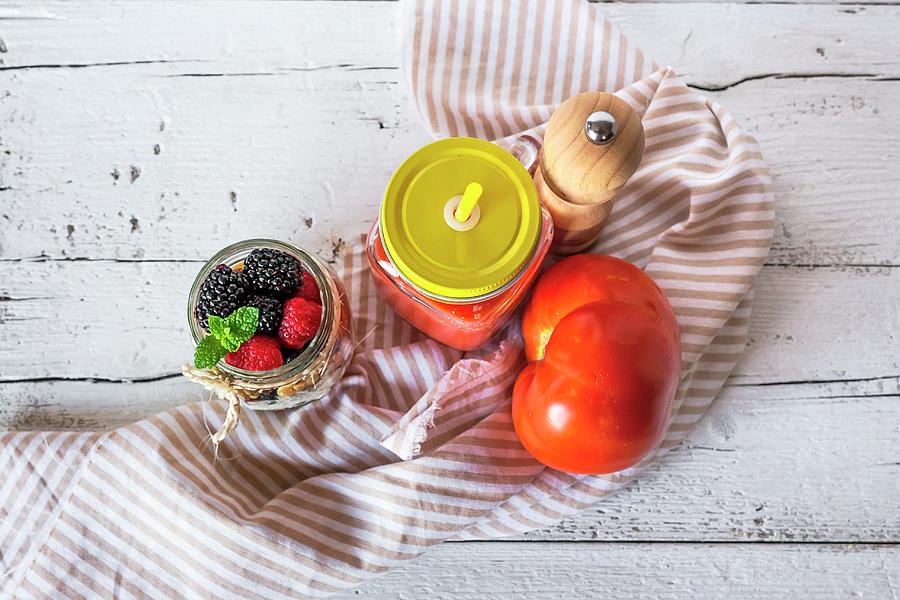 Cold Tomato Soup In A Jar Next To Muesli With A Jar Of Berries seen From Above Photograph by Eduardo Lopez Coronado