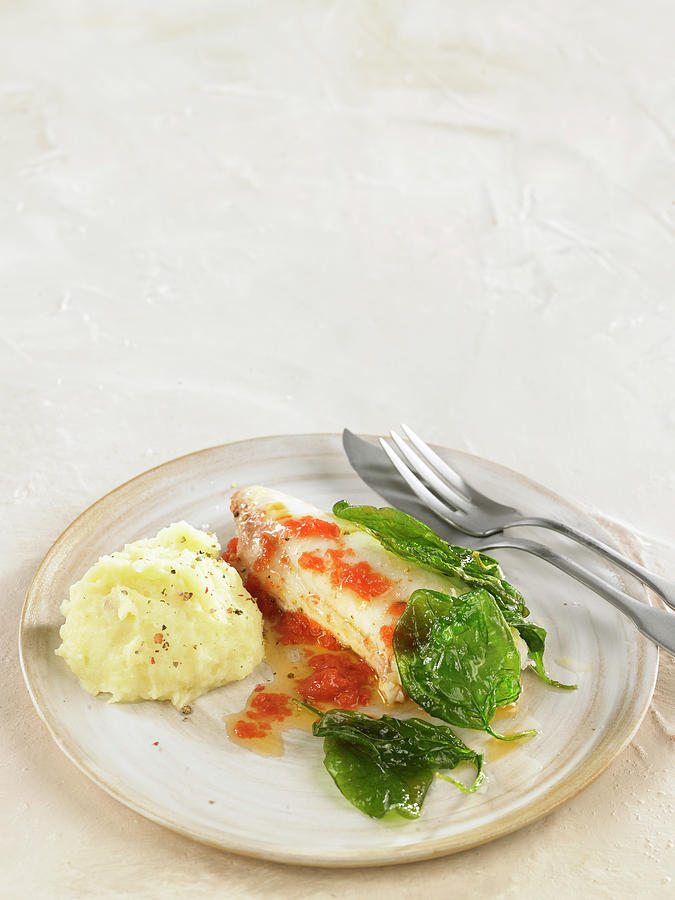 Coley Fillet With Crushed Tomatoes And Basil, Mashed Potatoes Photograph by Lawton