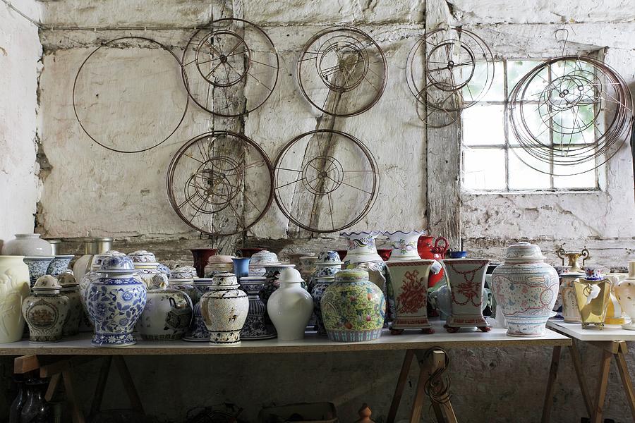 Collection Of Chinese Vases And Lampshade Frames In Old Workshop Photograph by Bodo Mertoglu