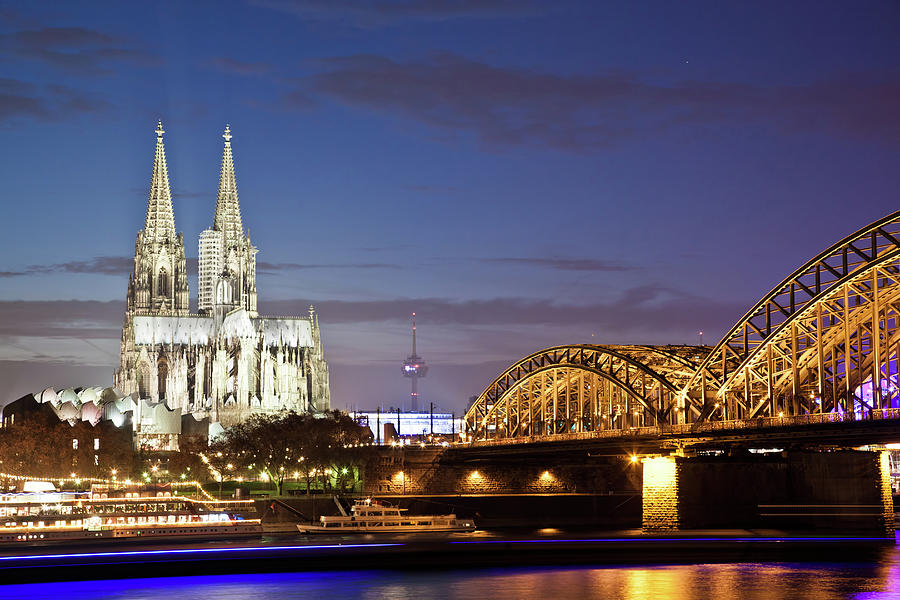 Cologne Cathedral And Rail Bridge Photograph by Tom Bonaventure