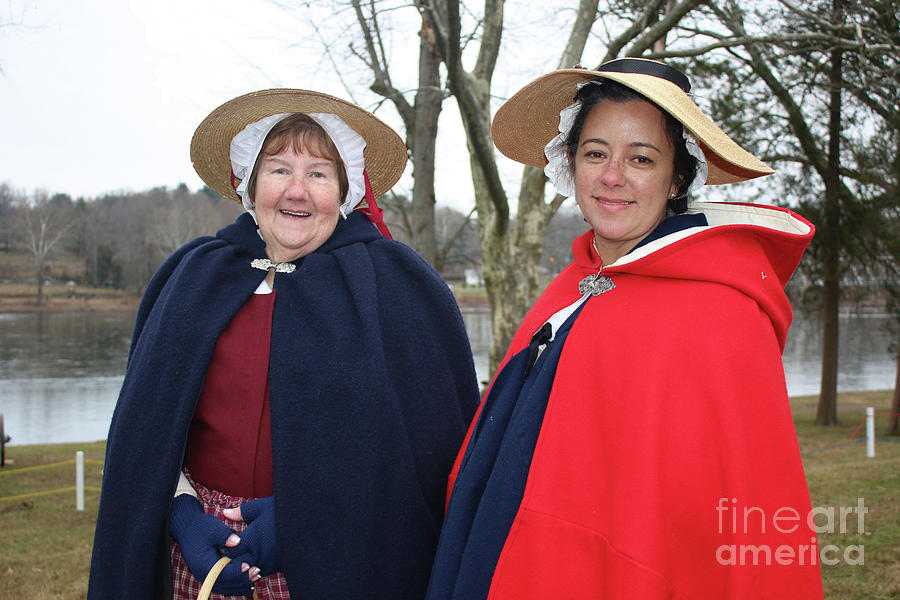 Colonial Women in Winter Capes Photograph by Sandy Moulder