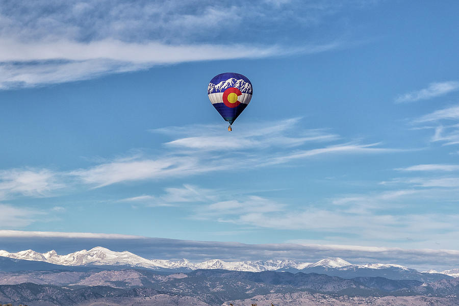 Colorado Flag Balloon Over the Mountains Photograph by Tony Hake