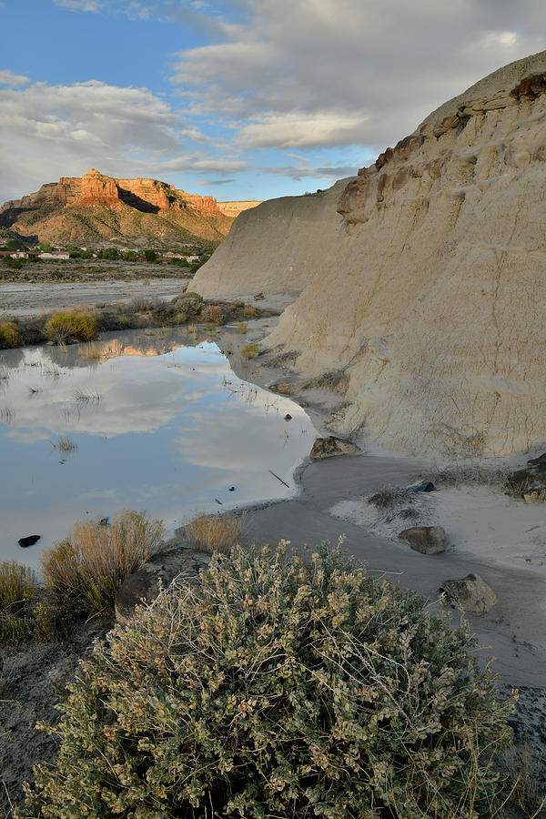 Colorado National Monument at Sunrise Reflected in Bentonite Pool Photograph by Ray Mathis