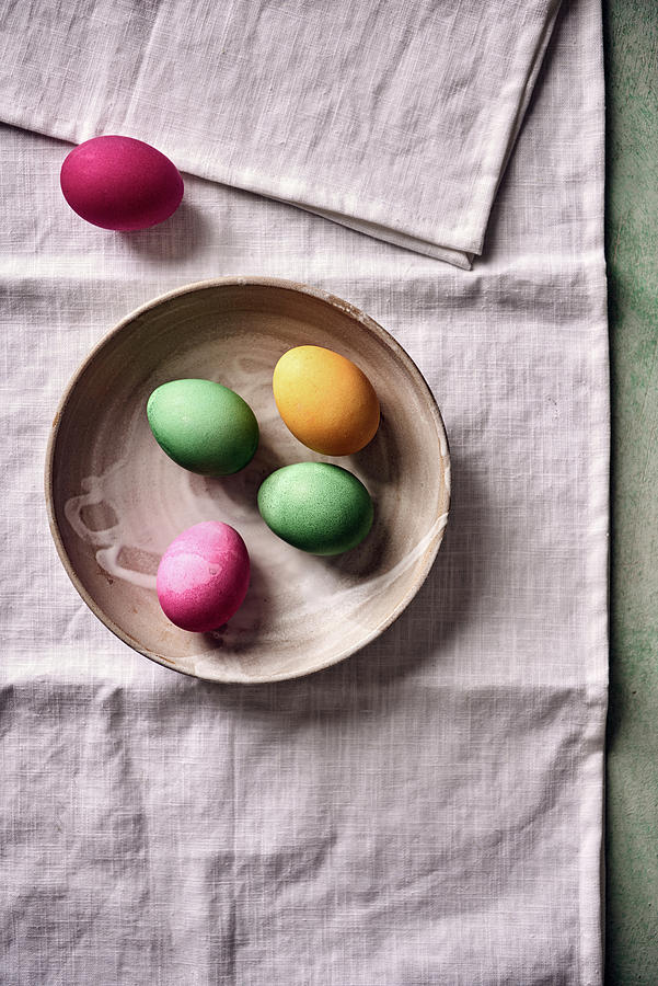 Colored Easter Eggs In A Ceramic Bowl Photograph by Angelika Grossmann