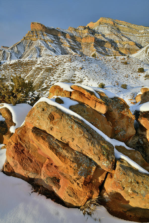 Colorful Boulders Beneath Snowy Book Cliffs Photograph by Ray Mathis