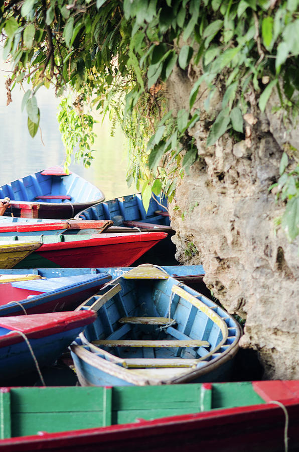 Colorful Canoes Photograph by Megan Ahrens