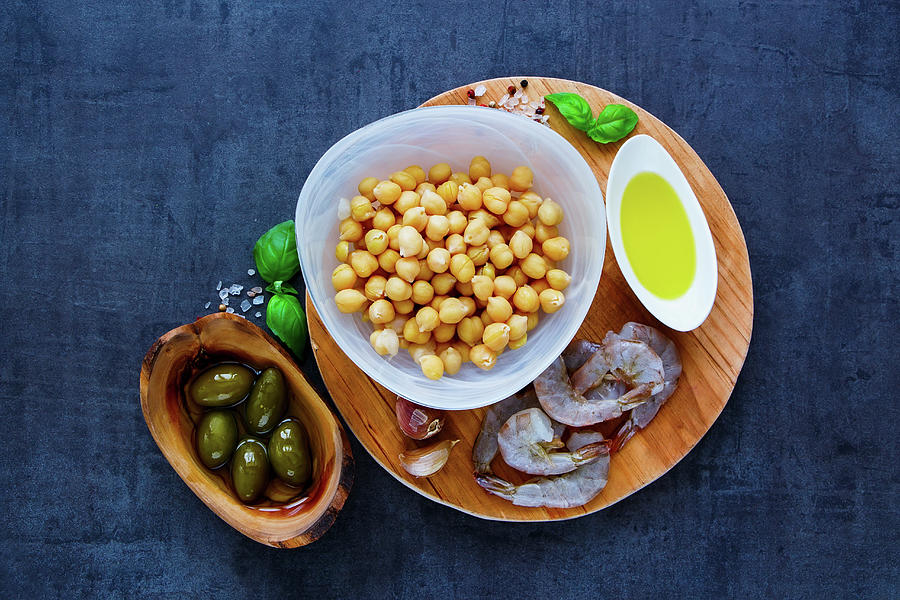 Colorful Chickpeas Salad Ingredients In Bowls On Round Wooden Board Over Dark Stone Concrete Background Photograph by Yuliya Gontar