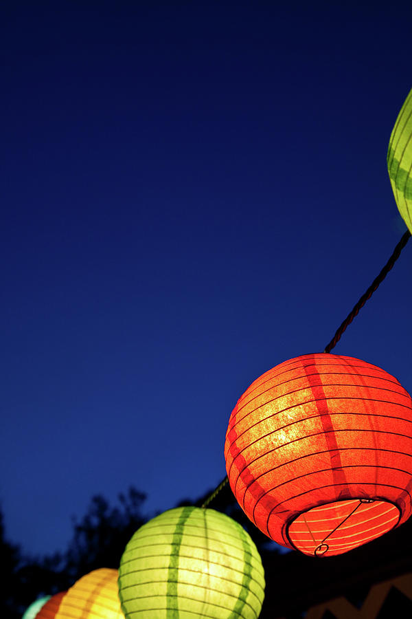 Colorful Chinese Lanterns Against Dusk Photograph by John Bencina