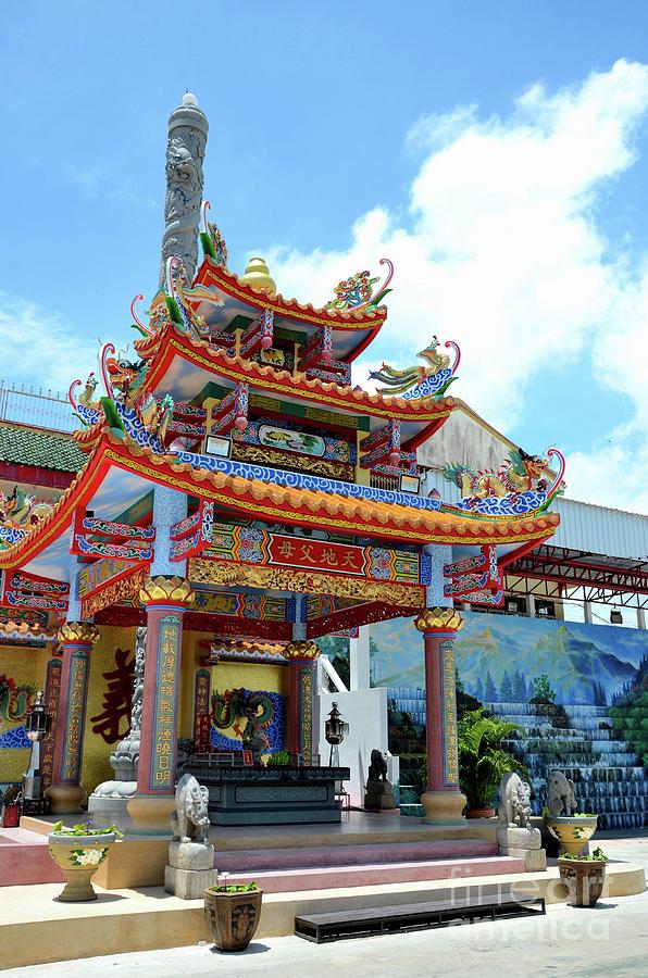 Colorful Chinese pagoda with altar and dragon fountain at temple Pattani Thailand Photograph by Imran Ahmed