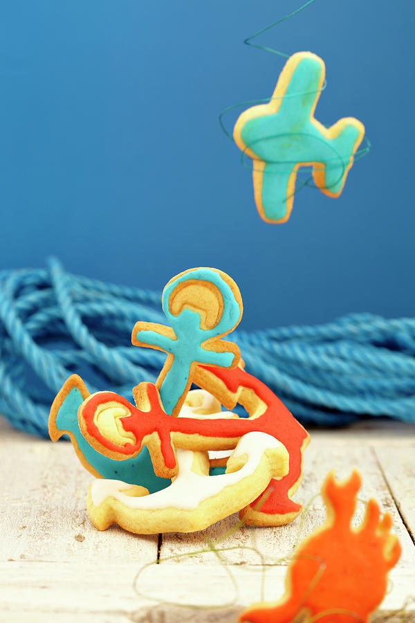 Colorful Maritime Biscuits In The Form Of Anchors, Airplanes And Crabs Photograph by Werner / S. Brigitte
