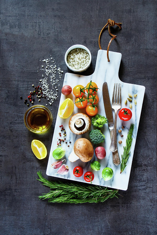 Colorful Vegetables And Spices On Marbre Cutting Board. Bio Healthy Food, Herbs And Spices Photograph by Yuliya Gontar