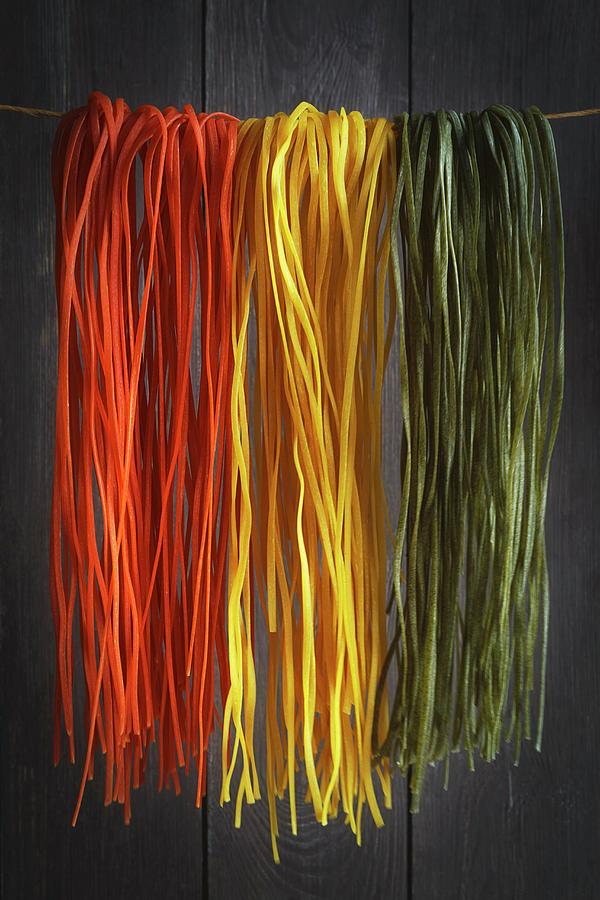 Coloured And Flavoured Linguine Photograph by Eva Grndemann