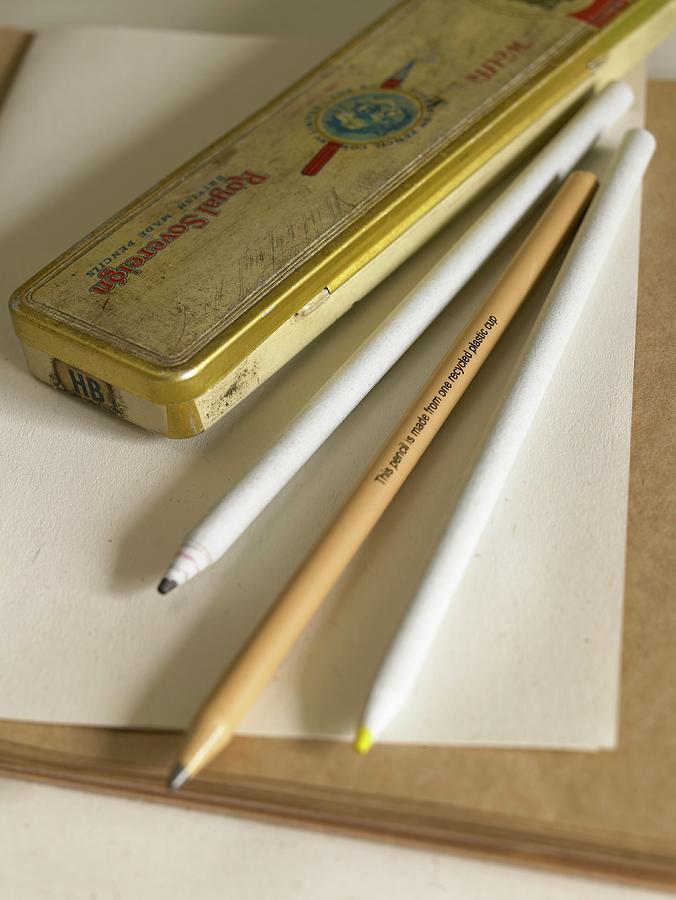 Vintage Photograph - Coloured Pencils And A Metal Tin On A Sheet Of Paper by Jo Tyler