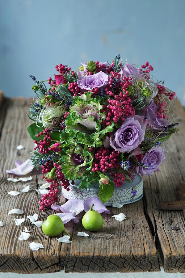 Colourful Arrangement Of Purple Roses, Ornamental Cabbage And Pink Pepper Photograph by Alena Hrbkov